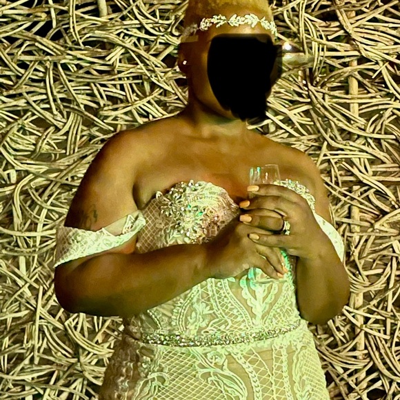 Elegant Lace Off-Shoulder Wedding Dress - Picture 2 of 5